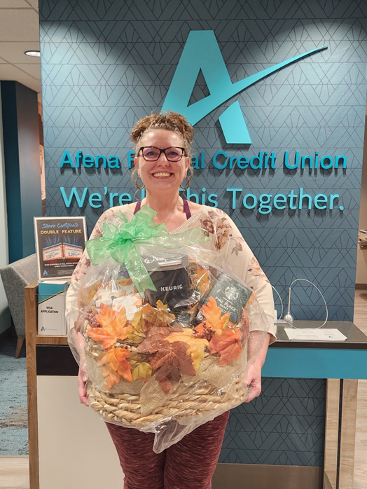 Toni W. holding her winning basket